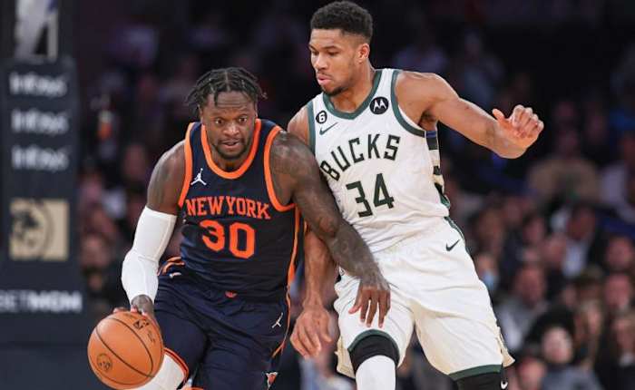 Randle (30) guarded by Bucks star Giannis Antetokounmpo
